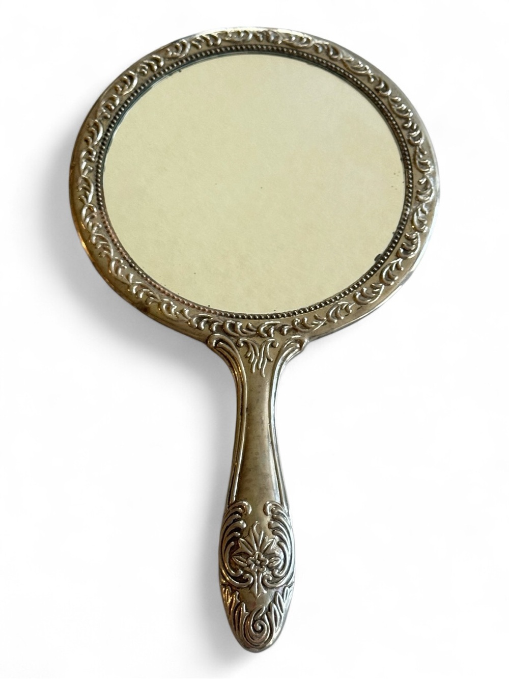 vintage silver-plated vanity hand mirror